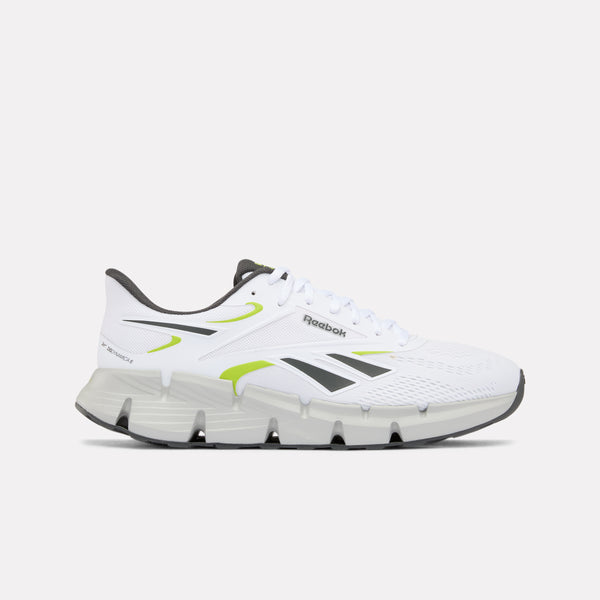 White Zig Dynamica 6 Men's running shoe with black and green accents on a white background