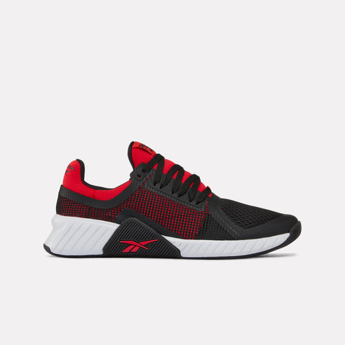 Čierno-červené pánske tréningové topánky Reebok Flip Charge v červeno-čiernej farbe s bielou podrážkou na svetlosivom pozadí