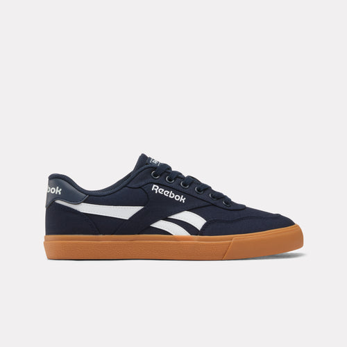Navy Reebok Court Advance Vulc Men's Sneaker with white stripe and brown sole on a light gray background