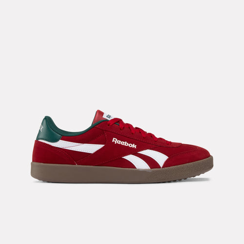 Červená teniska Reebok Smash Edge so zelenými akcentmi na bielom pozadí