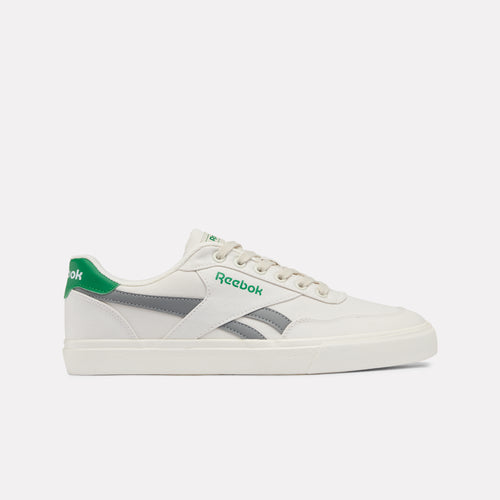 White Reebok Court Advance Vulc Men's Sneaker with green accents on a white background