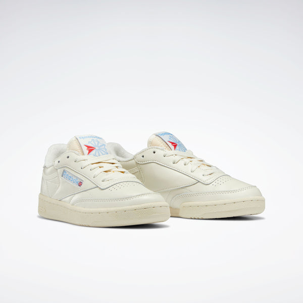Pair of cream-colored Club C 85 Vintage Women's Sneaker with the Reebok brand logo on a white background