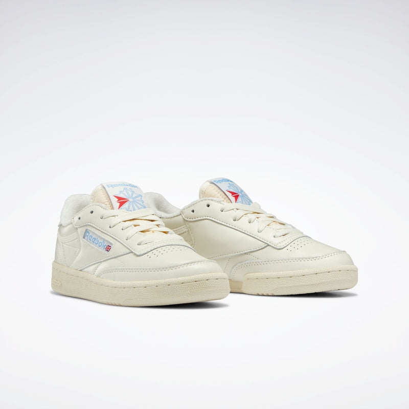 Pair of cream-colored Club C 85 Vintage Women's Sneaker with the Reebok brand logo on a white background