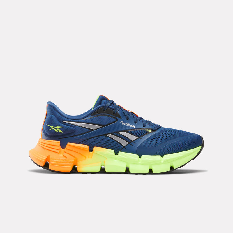 Blue FloatZig 2 Men's Running Shoe with orange and green sole on a white background