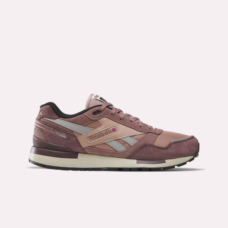 A Reebok GL1600 Men's sneaker in dusty rose and taupe suede with light blue and beige accents, shown from the side on a light gray background.